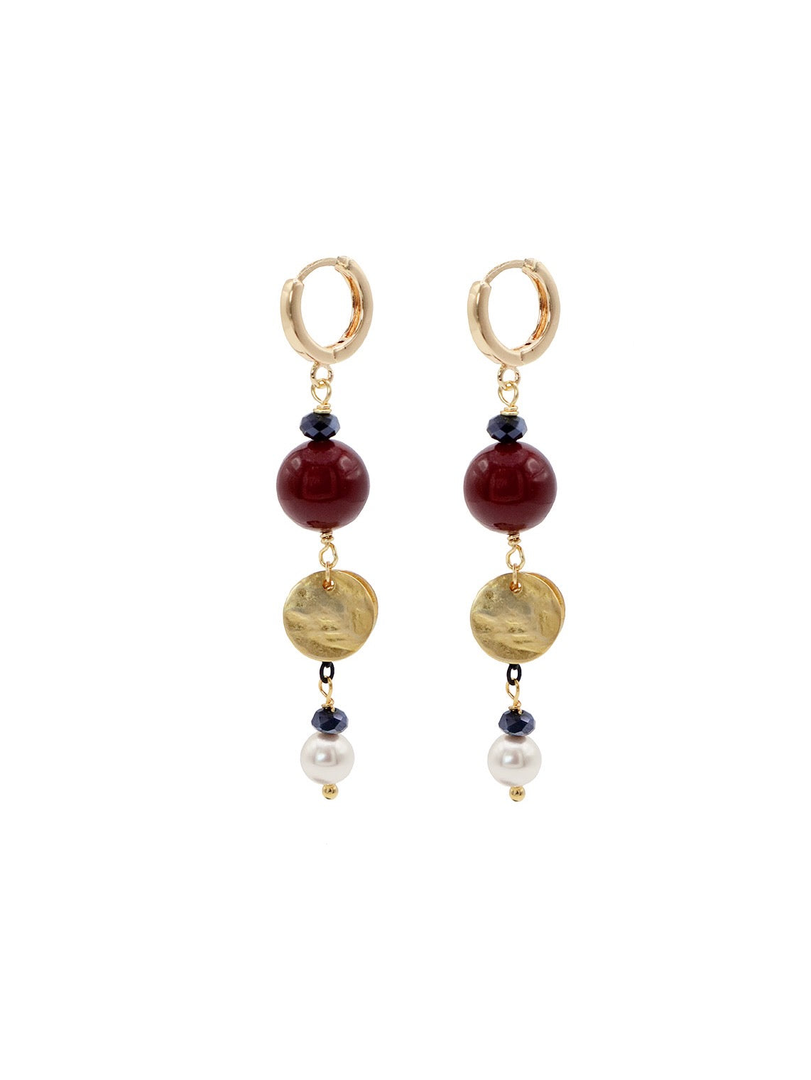 Pair of gold hoop earrings with burgundy shell pearls, gold discs , and pearl beads on a white background