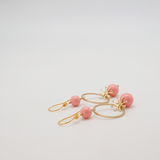 akira earrings coral