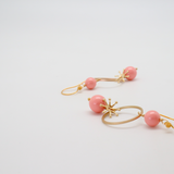 akira earrings coral