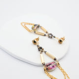 Statement double loop chain earrings with iridescent glass beads and gold bars