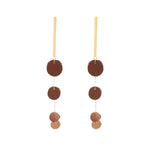 A pair of bronze-colored earrings with sequin discs and gold-filled chain, hanging from matte gold bar posts.