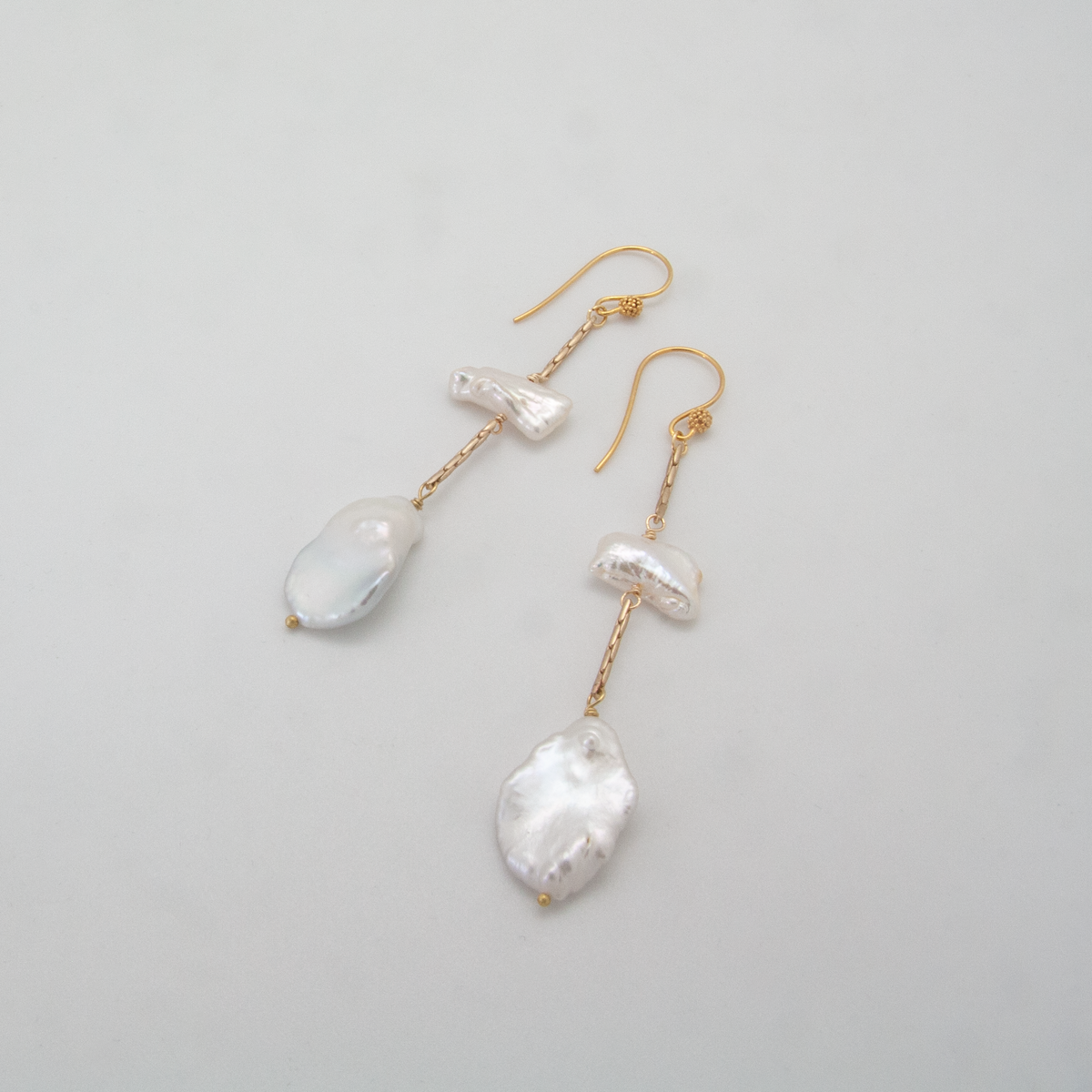baroque pearl T earrings