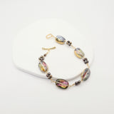 Bracelet with colorful beads on a white background