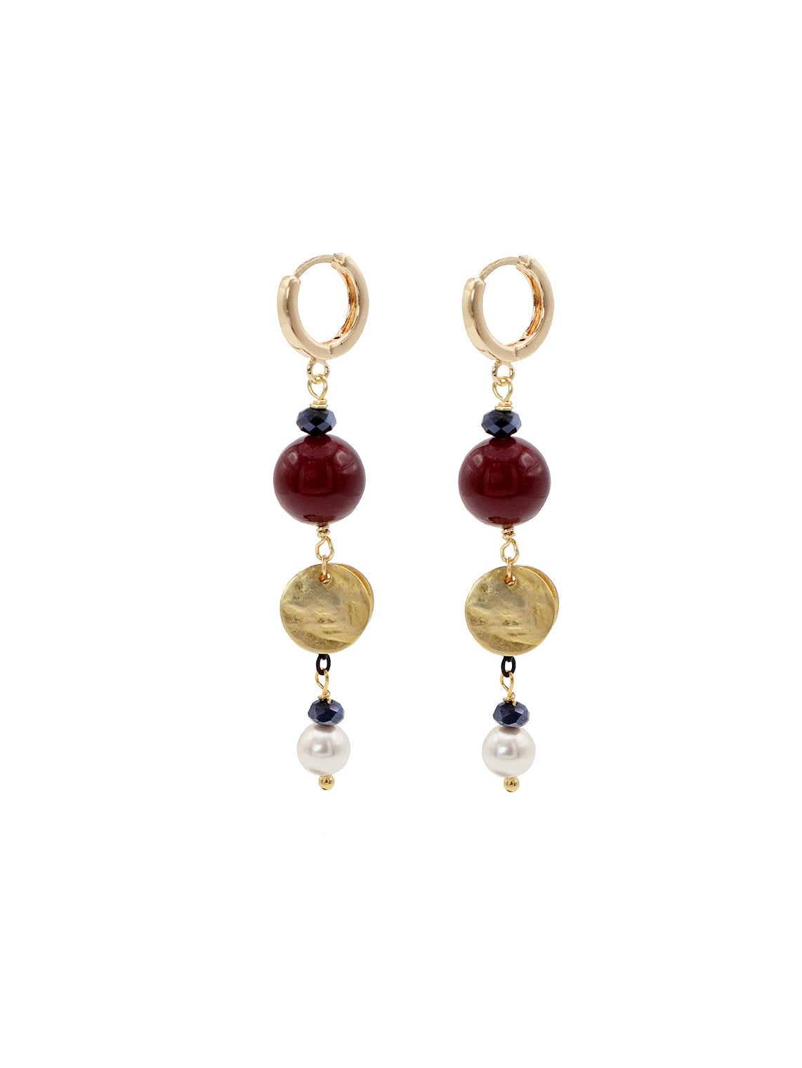 Pair of gold hoop earrings with burgundy shell pearls, gold discs , and pearl beads on a white background