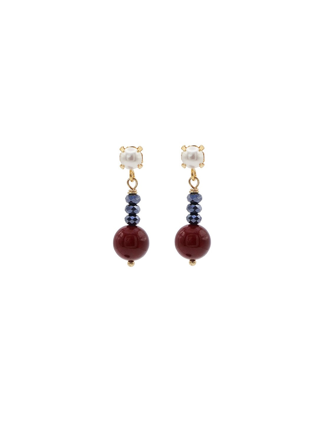 Pair of earrings with burgundy and jet  beads and pearl-like tops on a white background