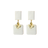 gisele earrings white