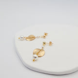 ripple disc earrings white