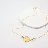 disc necklace