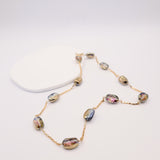 Necklace with multicolored beads on a white background