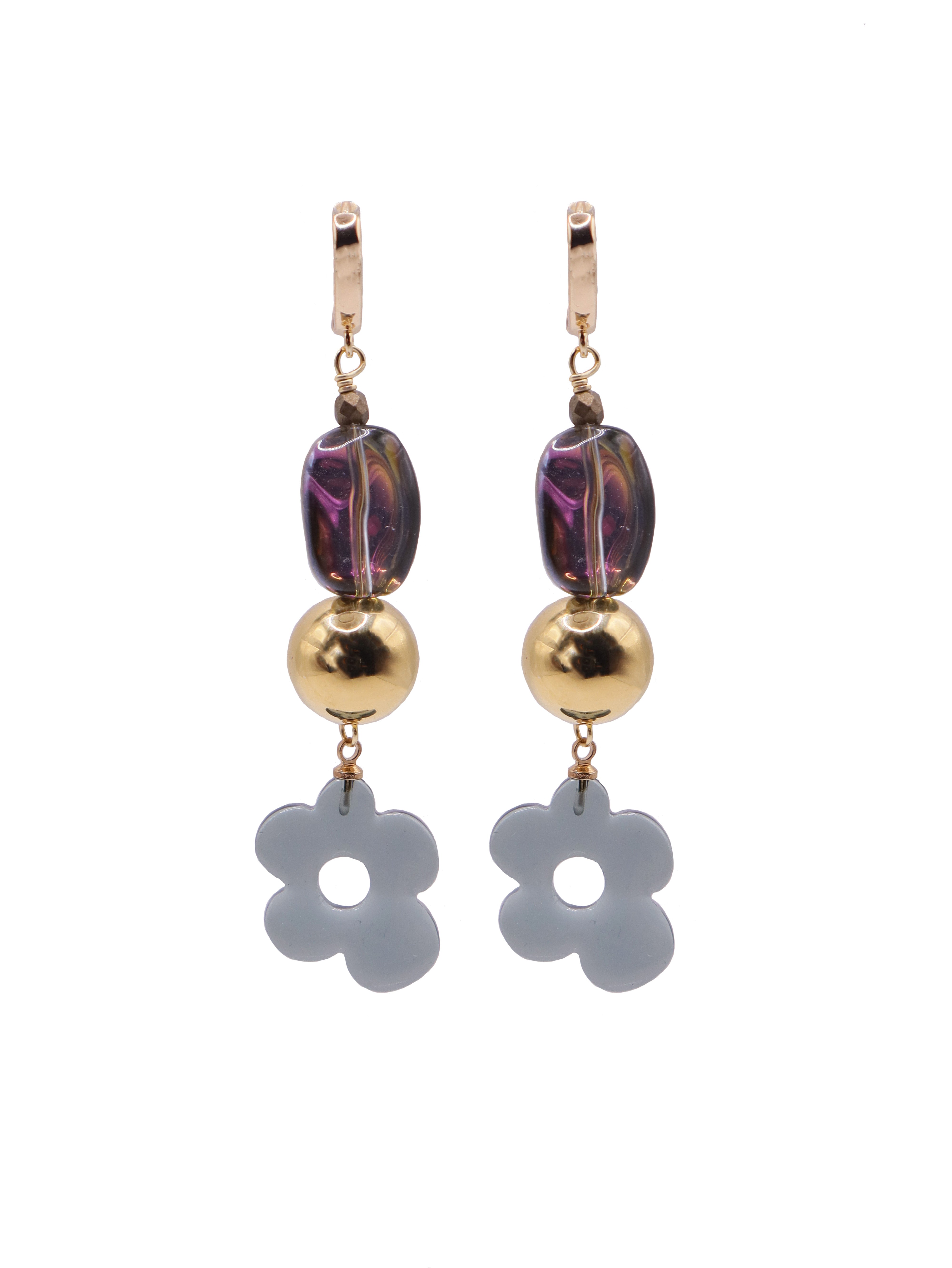 Pair of earrings with gold beads and flower-shaped charms on a white background