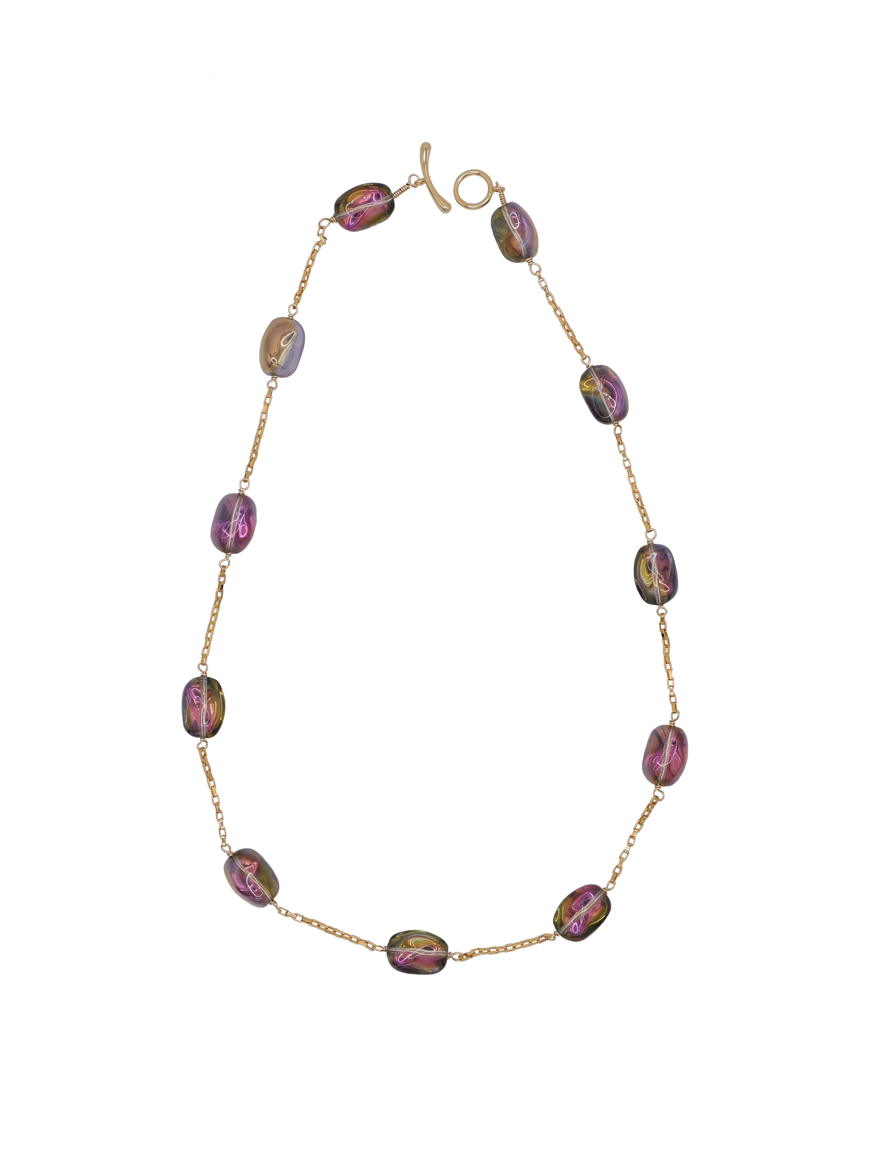 Necklace with irredescent beads on a white background