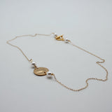 gold disc necklac ewith white pearls by vivien walsh