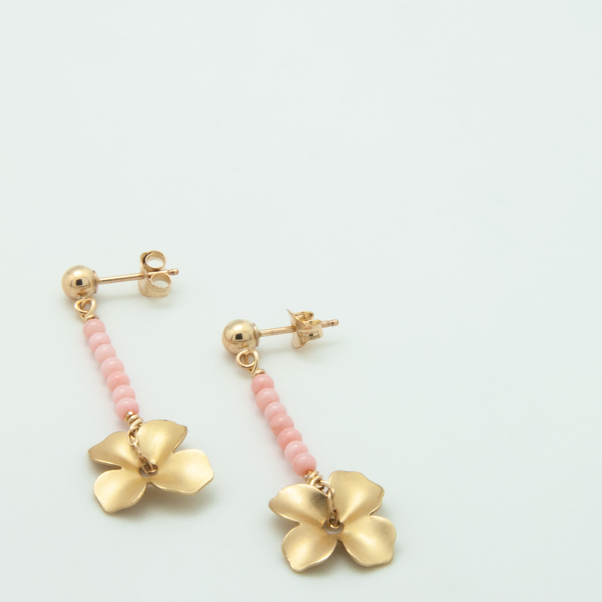 Beaded line flower earrings with coral