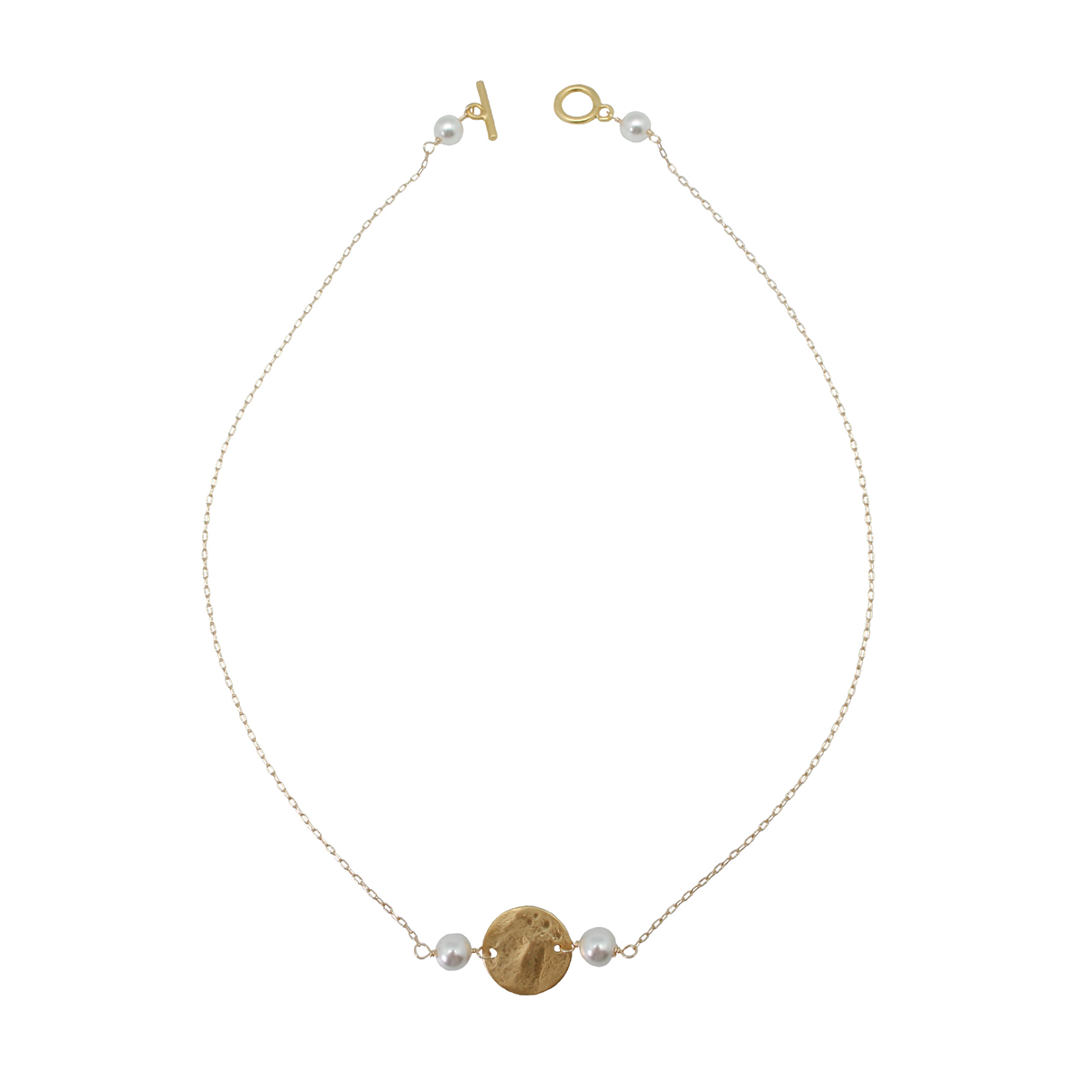 gold disc necklace with white pearls on white background