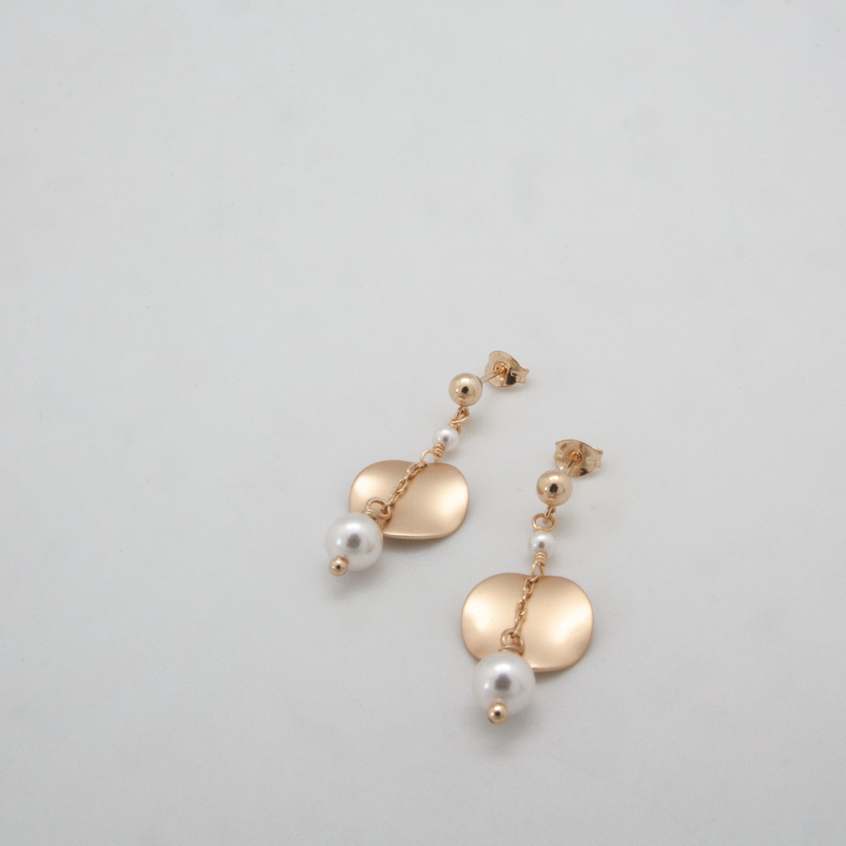 ripple disc earrings white